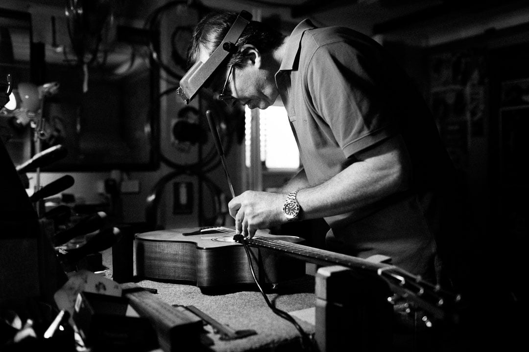 Chris Melville, guitar builder in Brisbane, working on one of his instruments